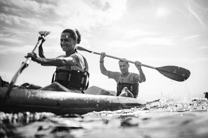 Man and woman kayaking together