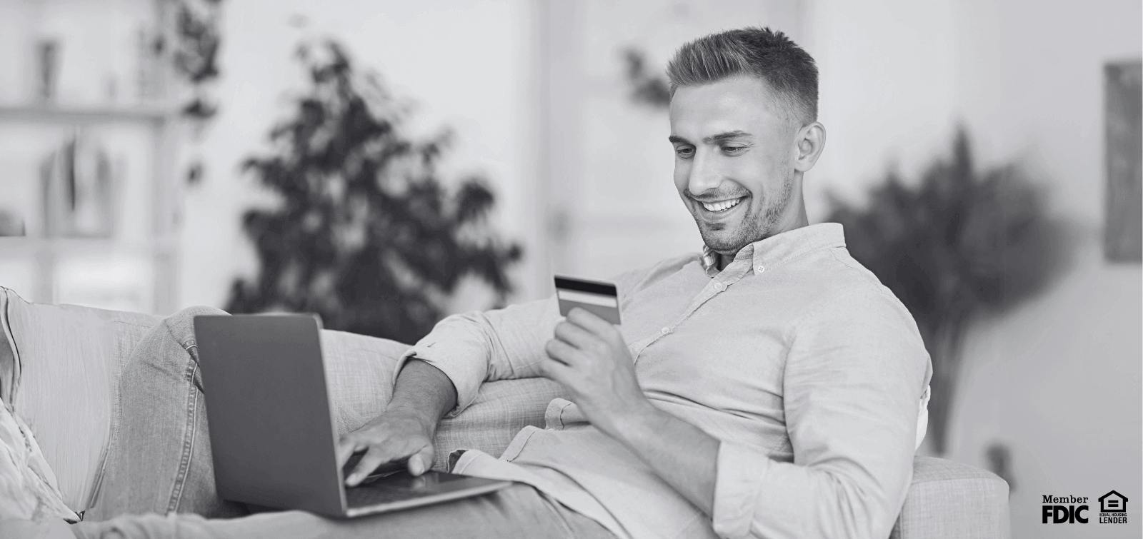 man checking his credit score through online banking